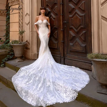 Liyuke грациозен пълен с дантела русалка сватбена рокля на разстояние рамото ръкави сладък тромпет булчински рокли